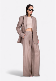 Model wearing beige crop top, front angle view – East Vibe